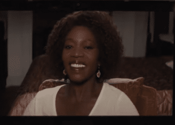 Juanita (Alfre Woodard) on a screen in the Netflix movie 'Juanita'.