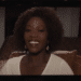 Juanita (Alfre Woodard) on a screen in the Netflix movie 'Juanita'.