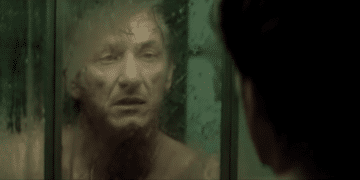 Jim Terrier (Sean Penn) looking himself at the mirror in the movie 'The Gunman'.