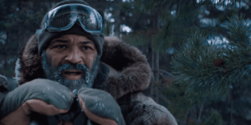 Russell Core (Jeffrey Wright) watching a group of wolf in the Netflix movie 'Hold The Dark'.