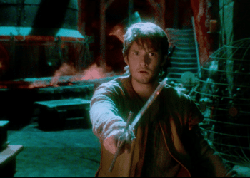 Tom Ward (Ben Barnes) wielding a sword in the movie 'Seventh Son'.