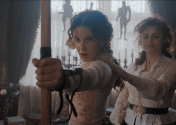 Enola Holmes (Millie Bobby Brown) playing with his Mother (Helena Bonham Carter) in the Netflix movie 'Enola Holmes'.