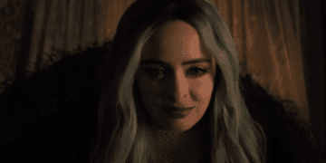 Natacha (Krysten Ritter) scaring a child in the Netflix movie 'Nightbooks'.