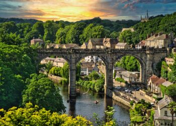 A view of the Viaduct from Knaresborough Castle, North Yorkshire, UK. Summer greenery at sunset.