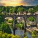 A view of the Viaduct from Knaresborough Castle, North Yorkshire, UK. Summer greenery at sunset.