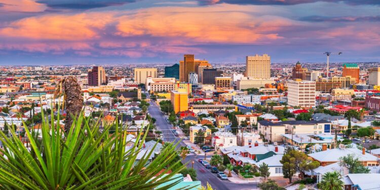 El Paso, Texas, USA downtown city skyline at dusk with Juarez, Mexico in the distance.