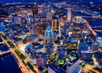 An aerial shot of the night Pittsburgh cityscape in Pennsylvania