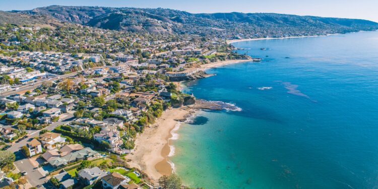 A view of the Main Beach Coastline in Laguna Beach, Southern California. Laguna Beach is a beach community that is a popular tourism destination and is located in Orange County.