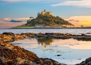 View of Mounts Bay and St Michael's Mount island in Cornwall at sunset